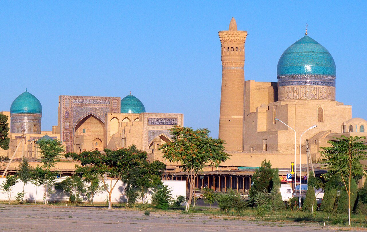 Minaret and turquoise domes of the Poi Kalyan ensemble in Bukhara
